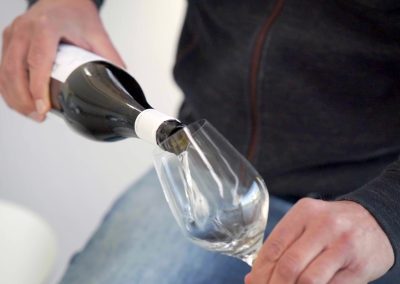 Pouring a glass of The Better Half Sauvignon Blanc