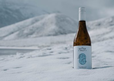 A bottle of wine in the snow